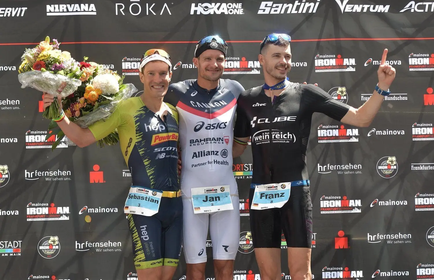 Ihn hat er noch nicht schlagen können: Franz Löschke (r.) und Olympiasieger Jan Frodeno (M.).