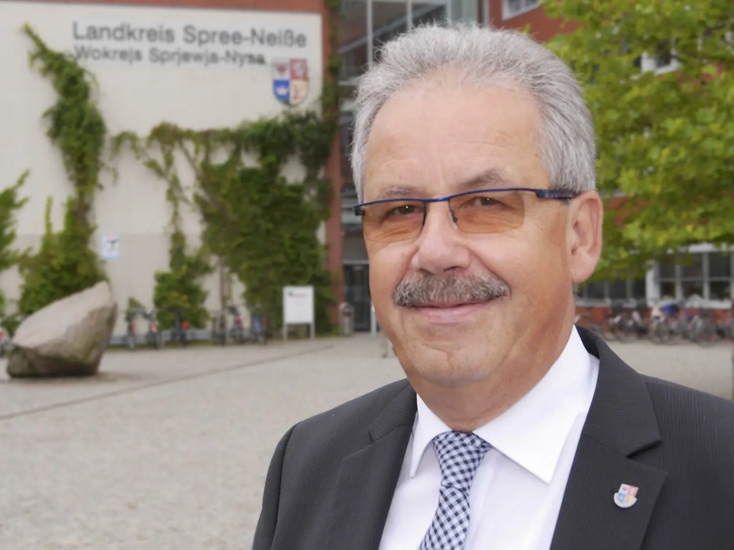 Spree-Neiße-Landrat Harald Altekrüger (CDU) warnt vor einem vorzeitigen Kohleausstieg.