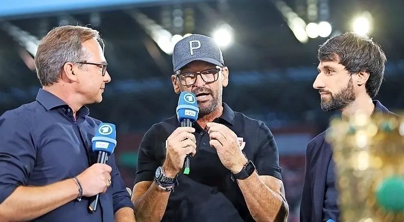 Trainer Claus-Dieter Wollitz (M.) und sein Team konnten vor einem Millionenpublikum in der ARD ein positives Bild des FC Energie präsentieren.