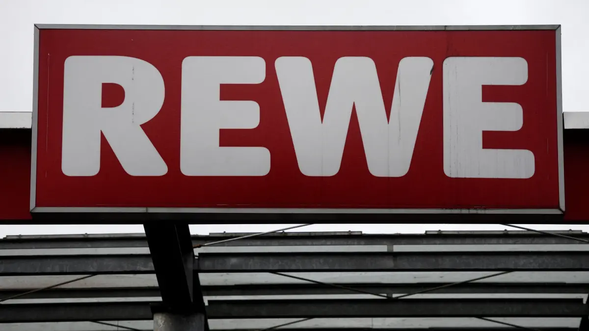 A picture taken on February 3, 2020 shows the entrance of a Rewe City supermarket in Dortmund, Germany. (Photo by INA FASSBENDER / AFP)
