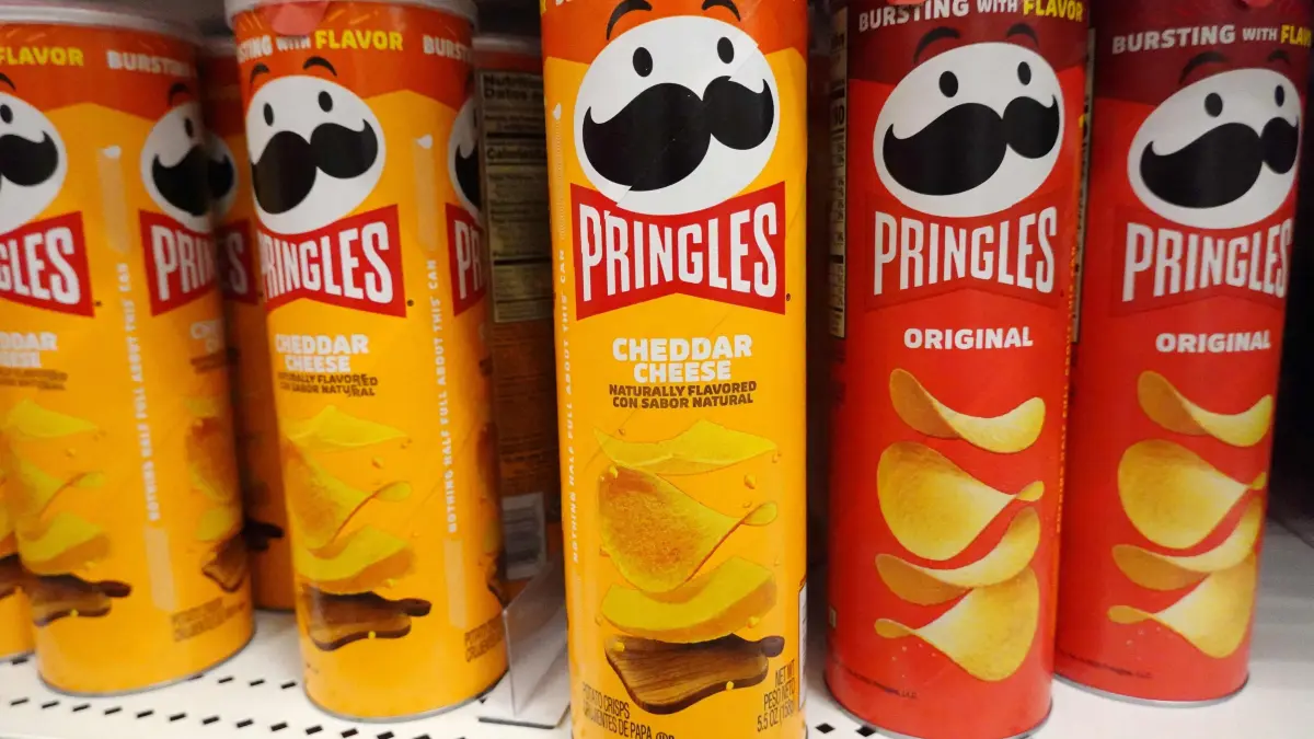Mars Purchases Popular Snack Maker Kellanova For 36 Billion: LOS ANGELES, CALIFORNIA - AUGUST 14: Packages of Pringles potato chips are displayed for sale in a store on August 14, 2024 in Los Angeles, California. Candy giant Mars is purchasing Kellanova, the maker of Pringles, Eggo, and Cheez-It brands, in a deal valued at about $36 billion. Mario Tama/Getty Images/AFP (Photo by MARIO TAMA / GETTY IMAGES NORTH AMERICA / Getty Images via AFP)