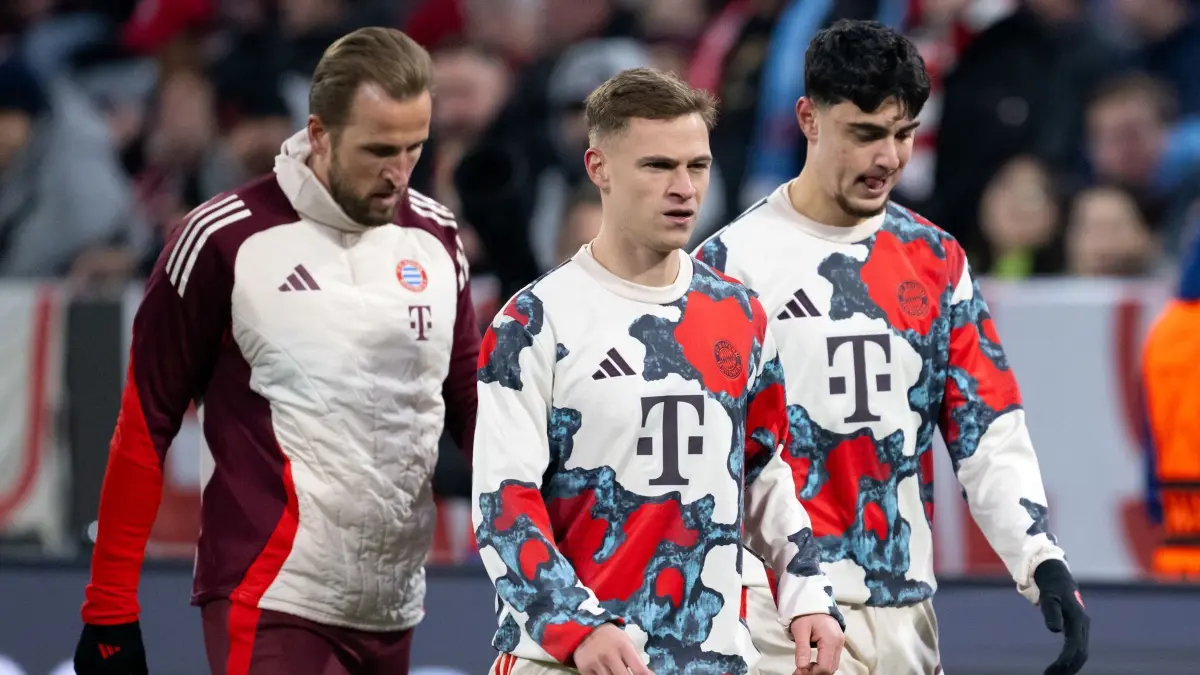 Bayern München - Slovan Bratislava: 29.01.2025, Bayern, München: Fußball: Champions League, Bayern München - Slovan Bratislava, Vorrunde, 8. Spieltag in der Allianz Arena. Harry Kane (l-r), Joshua Kimmich und Aleksandar Pavlovic von München wärmen sich auf. Foto: Sven Hoppe/dpa +++ dpa-Bildfunk +++