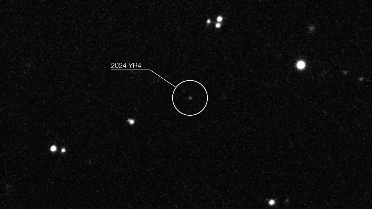 This handout image released by The European Southern Observatory (ESO) on February 25, 2025, shows an image of the asteroid '2024 YR4' taken by ESO?s Very Large Telescope (VLT), showing a frame of the asteroid?s path through the night sky in January 2025, observed at infrared wavelengths with the HAWK-I instrument. The chance that a football field-sized asteroid capable of destroying a city will strike Earth in 2032 has fallen to 0.001 percent, the European Space Agency said on February 25, 2025. A week ago, the asteroid set a new record for having the highest probability of hitting Earth -- 3.1 percent according to NASA and 2.8 percent according to the ESA. The planetary defence community has been scanning the skies. (Photo by Handout / European Southern Observatory / AFP) / RESTRICTED TO EDITORIAL USE - MANDATORY CREDIT "AFP PHOTO/EUROPEAN SOUTHERN OBSERVATORY " - NO MARKETING NO ADVERTISING CAMPAIGNS - DISTRIBUTED AS A SERVICE TO CLIENTS