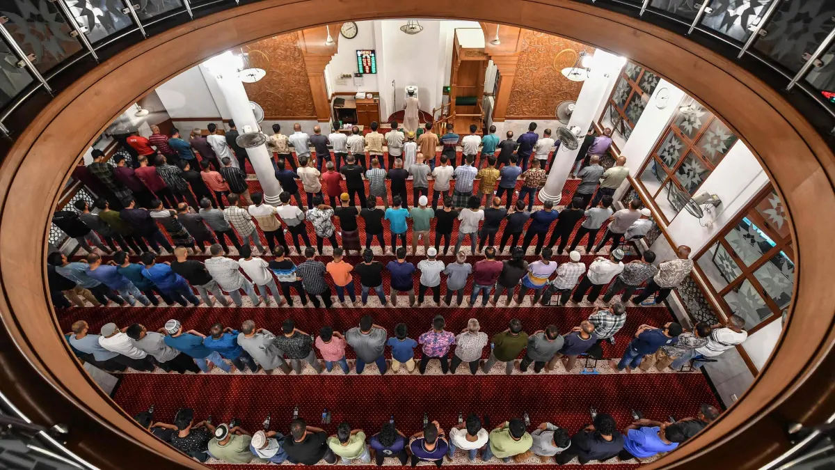 Muslims perform 'Tahajjud', a special night prayer, during the Islamic holy fasting month of Ramadan at a mosque in Male, in Maldives on March 27, 2025. (Photo by Mohamed Afrah / AFP)