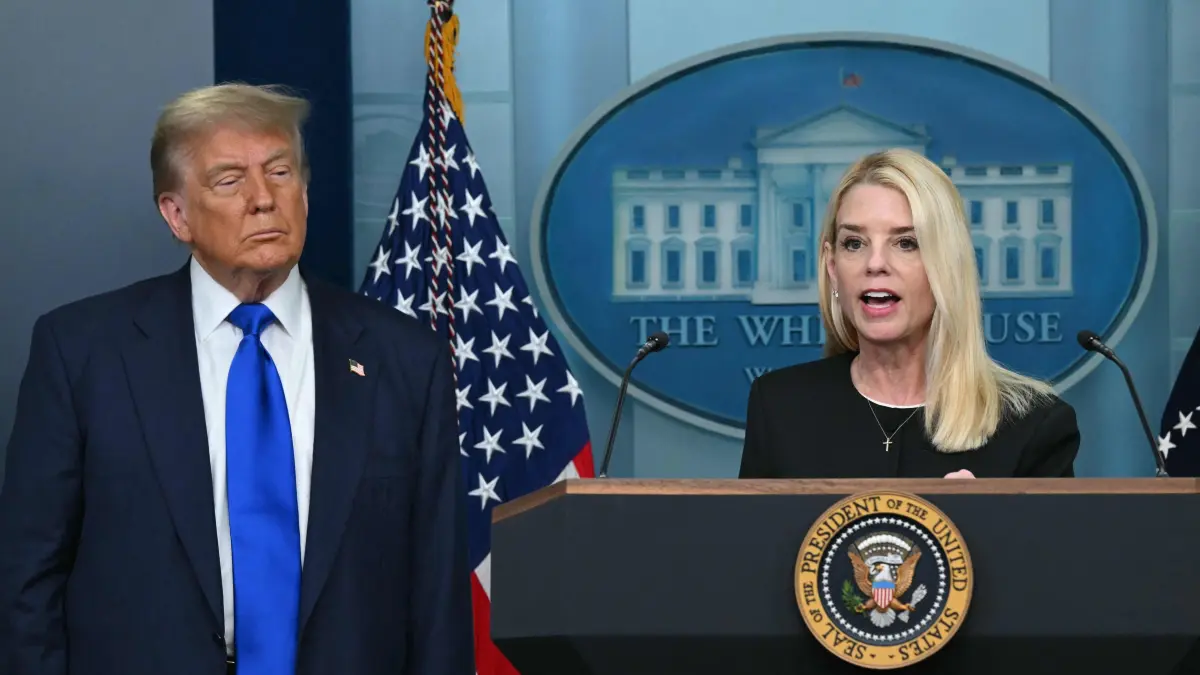 (FILES) US Attorney General Pam Bondi (R) speaks during a news conference with President Donald Trump in the Brady Briefing Room of the White House on June 27, 2025, in Washington, DC. President Donald Trump attempted on July 18, 2025 to control the storm triggered by a bombshell report on his friendship with Jeffrey Epstein, ordering the Justice Department to seek the release of testimony from the prosecution of the late, alleged sex-trafficker-to-the-famous. (Photo by ANDREW CABALLERO-REYNOLDS / AFP)