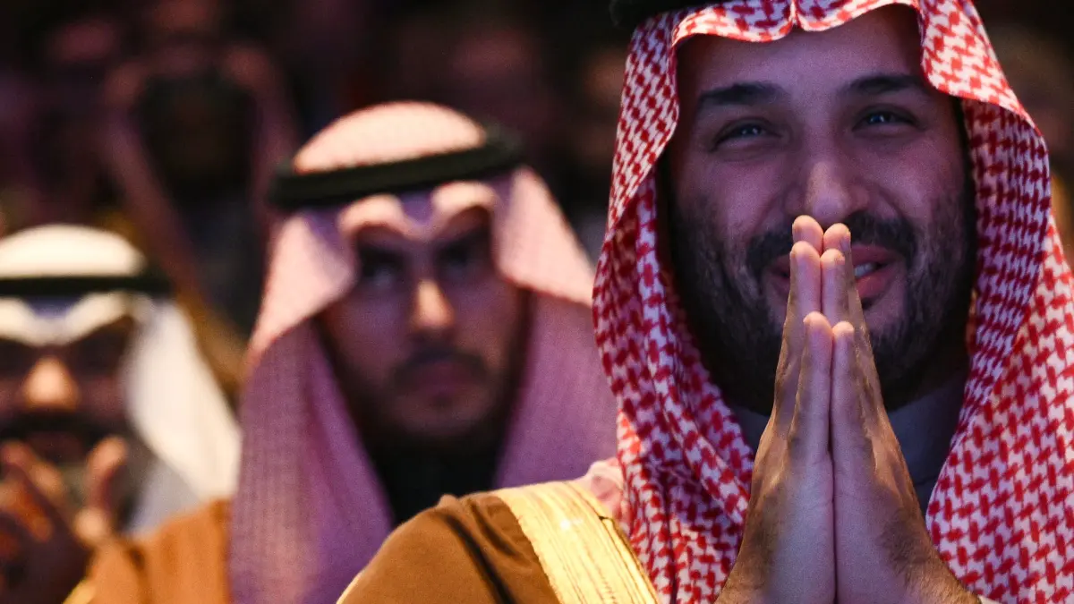 President Donald Trump delivers remarks at the US-Saudi Investment Forum: Crown Prince and Prime Minister of the Kingdom of Saudi Arabia Mohammed bin Salman and member of the Saudi Arabia reacts as US President Donald Trump speaks during the US-Saudi Investment Forum at the John F. Kennedy Center for the Performing Arts in Washington, DC on November 19, 2025. (Photo by Brendan SMIALOWSKI / AFP)