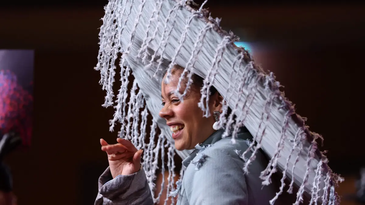 776458798: German actress Jane Chirwa arrives on the red carpet for the premiere of the film "No Good Men" presented in the Berlinale Special Gala section and opening the 76th Berlinale, Europe's first major film festival of the year, in Berlin on February 12, 2026. (Photo by Ronny HARTMANN / AFP)