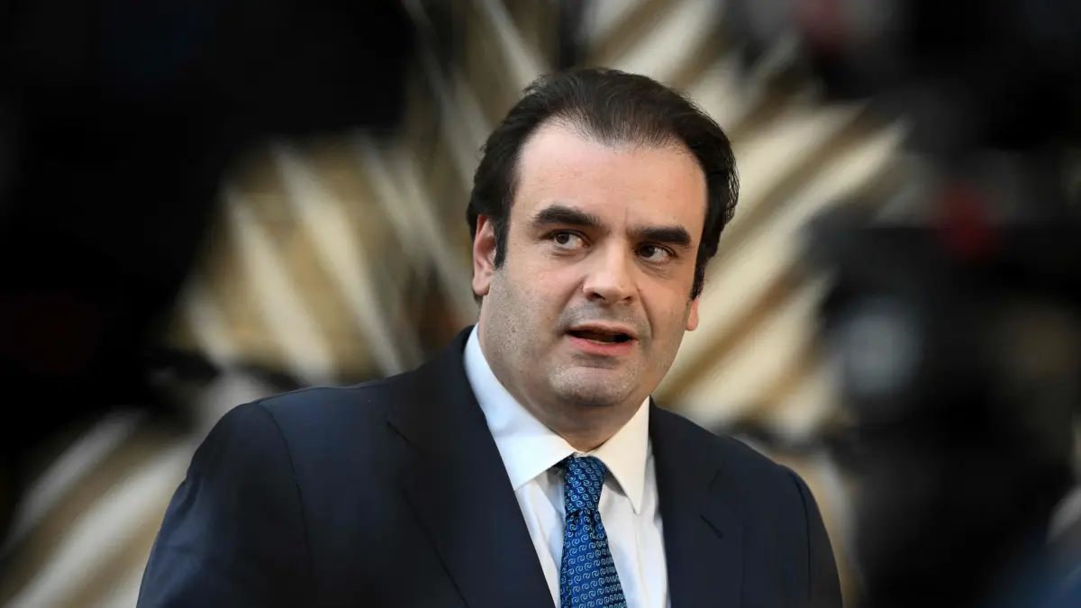 Eurogroup's President Kyriakos Pierrakakis speaks to the press as he arrives to attend a Eurogroup meeting at the European Council in Brussels on March 9, 2026. (Photo by Nicolas TUCAT / AFP)