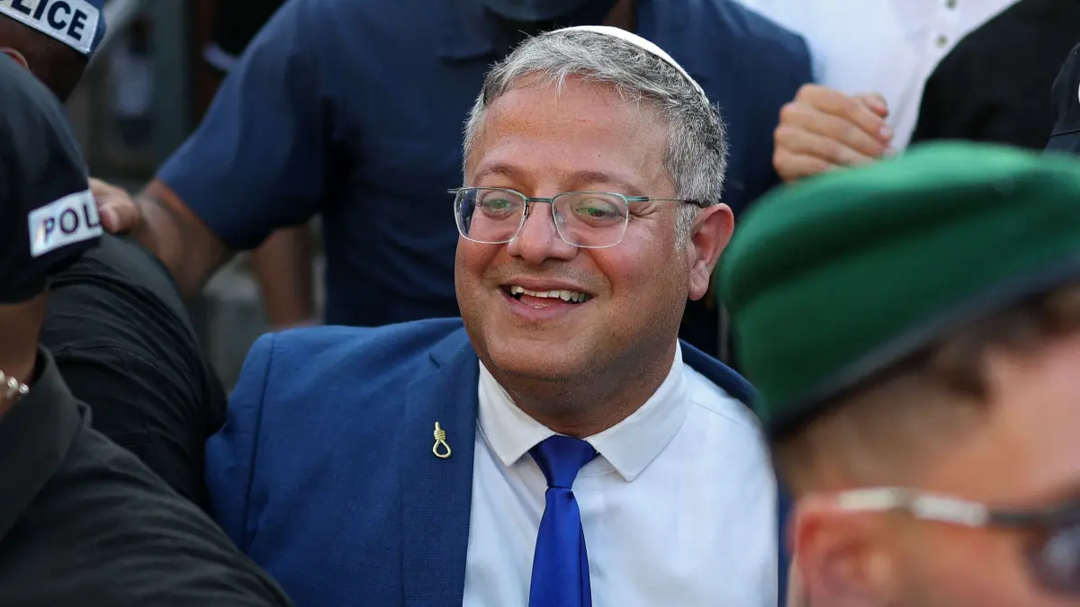 Israel's National Security Minister Itamar Ben Gvir (C) takes part in the Jerusalem Day parade at the Damascus Gate in the old city of Jerusalem on May 14, 2026. Every year, thousands of Israeli nationalists, many of them religious Jews, march through Jerusalem and its annexed Old City, including in predominantly Palestinian neighbourhoods, waving Israeli flags, dancing and sometimes shouting inflammatory slogans. (Photo by Ilia YEFIMOVICH / AFP)