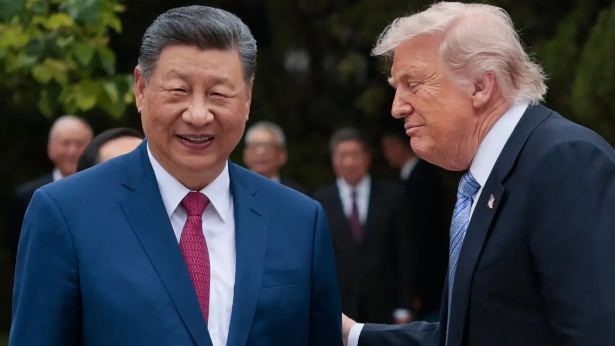 US President Donald Trump (R) speaks with China’s President Xi Jinping as he leaves after a visit to Zhongnanhai Garden in Beijing on May 15, 2026. (Photo by Evan Vucci / POOL / AFP)