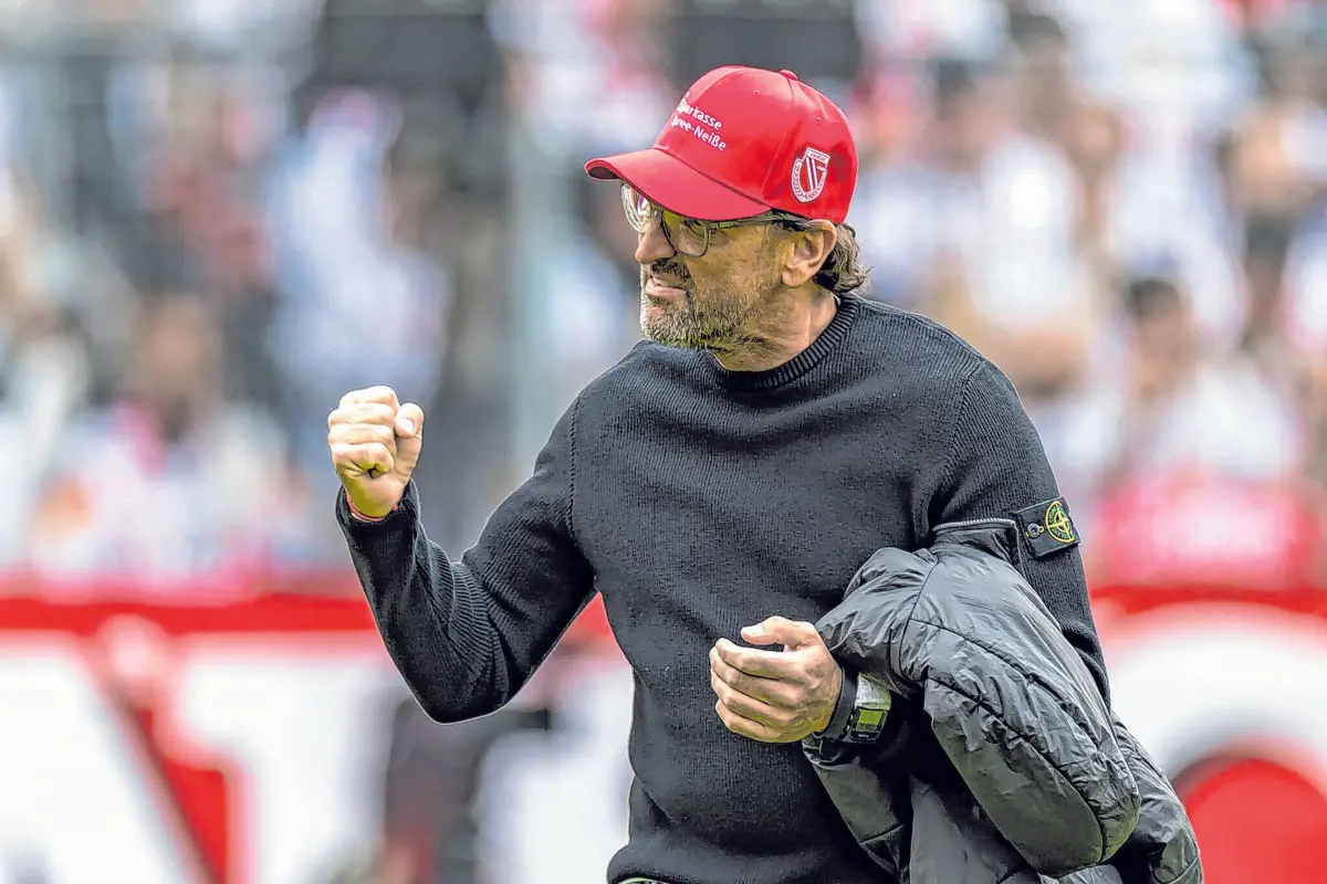 Der Trainer.