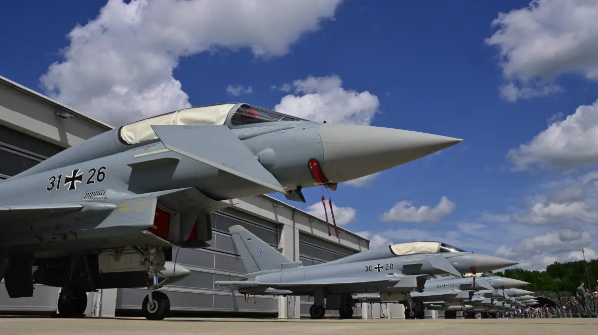 Eurofighter combat aircrafts are displayed during the Armed Forces Day at the Airbase in Laage, Germany, on June 06, 2026. Along with nine other locations, Laage hosts the Armed Forces Day 2026. (Photo by John MACDOUGALL / AFP)