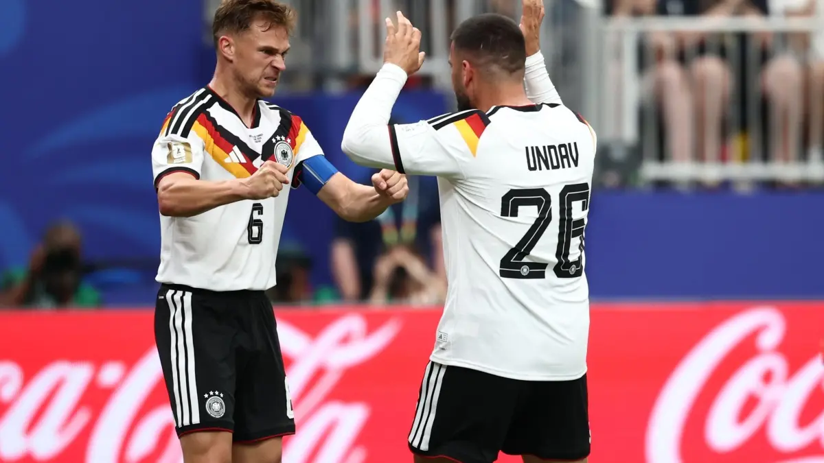 WM 2026 - Deutschland - Curaçao: 14.06.2026, USA, Houston: Fußball, Männer: WM, Deutschland - Curaçao, Vorrunde, Gruppe E, 1. Spieltag, Houston-Stadion. Joshua Kimmich (l, Deutschland) und Deniz Undav (Deutschland) jubeln nach Undavs Treffer zum 6:1. ACHTUNG: Gemäß den Auflagen der FIFA dürfen die Bilder ausschließlich zur redaktionellen Verwendung genutzt werden. Eine kommerzielle Nutzung ist ausgeschlossen. Zudem dürfen keine videoähnlichen Sequenzen erstellt werden, und es dürfen keine Veränderungen weder im Vordergrund noch im Hintergrund am Bild vorgenommen werden. Foto: Christian Charisius/dpa +++ dpa-Bildfunk +++