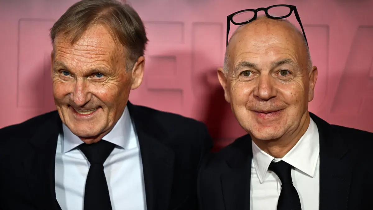 Hans-Joachim Watzke und Bernd Neuendorf: ARCHIV - 26.01.2026, Hessen, Frankfurt/Main: Fußball: Bundesliga, Neujahrsempfang der Deutschen Fußball Liga (DFL) im Gesellschaftshaus Palmengarten. Hans-Joachim Watzke (l), Ligapräsident der DFL, und Bernd Neuendorf, Präsident des Deutschen Fußball-Bundes (DFB), kommen zum Neujahrsempfang der DFL. (zu dpa: «Kein Happy Birthday: Präsident Neuendorf als WM-Aufräumer») Foto: Florian Wiegand/dpa +++ dpa-Bildfunk +++