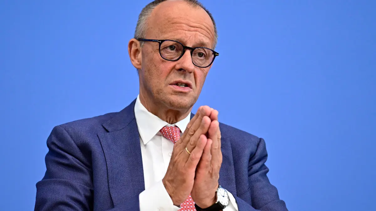 GERMANY-POLITICS-GOVERNMENT-MERZ: German Chancellor Friedrich Merz addresses journalists during his summer press conference in Berlin, Germany, on July 15, 2026. (Photo by Tobias SCHWARZ / AFP)