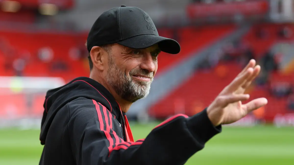 FILES-GER-KLOPP: (FILES) Liverpool Legends' manager Jurgen Klopp waves as he is back at Anfield for the Legends football match between Liverpool Legends and Dortmund Legends at Anfield in Liverpool, north-west England on March 28, 2026. Jurgen Klopp is widely expected to formally take over as the new head coach of the German men's national football team, with the German Football Association (DFB) calling a press conference for July 24, 2026. Klopp, famed for his success during stints as coach at Borussia Dortmund and especially Liverpool, has been in talks with the DFB about trying to lead Germany -- long a football powerhouse -- back to prominence. (Photo by PETER POWELL / AFP)