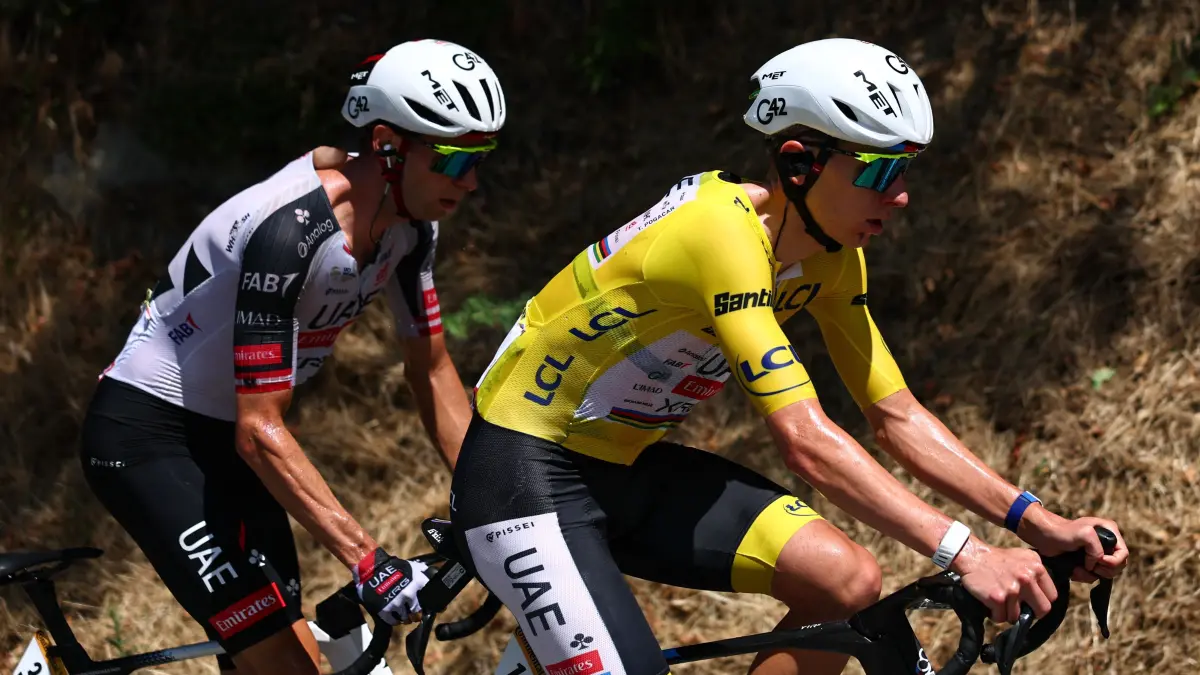 CYCLING-TDF-2026-STAGE 18: UAE Team Emirates - XRG's Slovenian rider Tadej Pogacar wearing the overall leader's yellow jersey cycles with the pack of riders (peloton) during the 18th stage of the 113th edition of the Tour de France cycling race, 185,2 km between Voiron and Orcières-Merlette in the French Alps, on July 23, 2026. (Photo by Anne-Christine POUJOULAT / AFP)