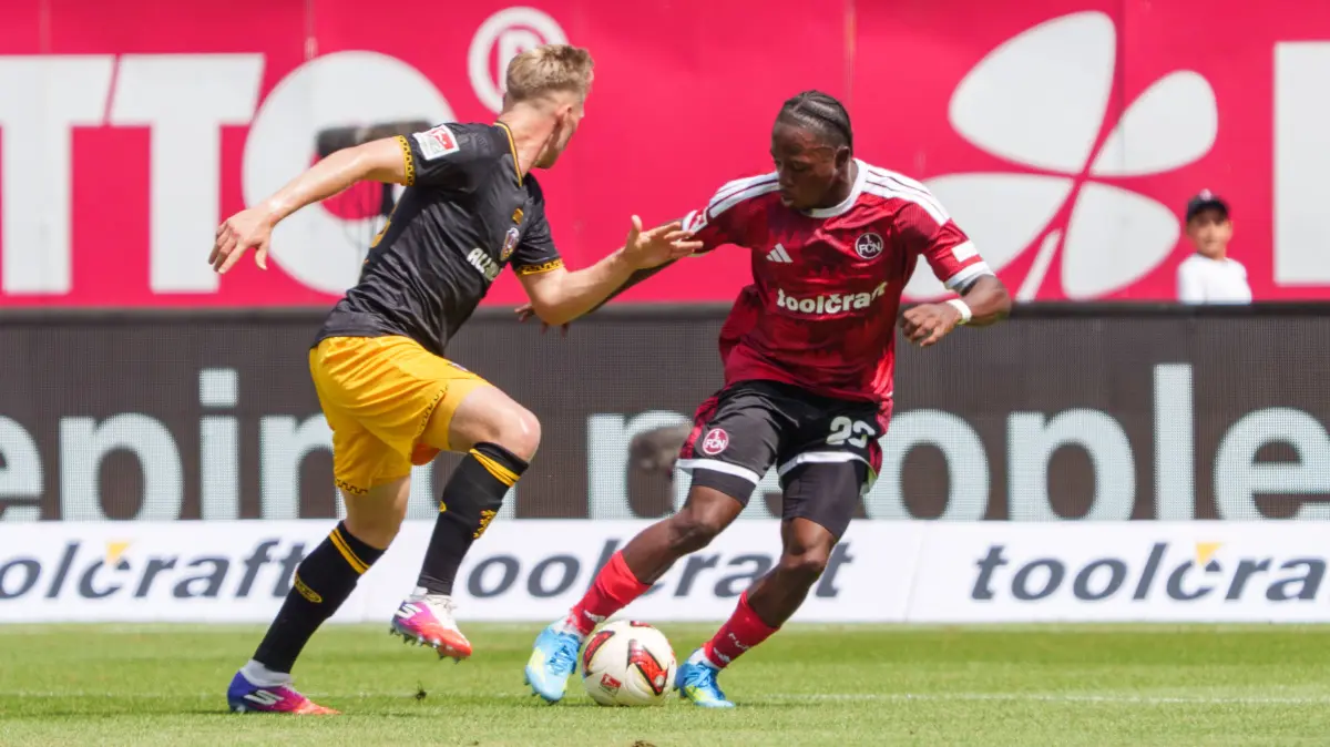 GER, 1. FC Nuernberg vs. Dynamo Dresden, Fussball, 2. Bundesliga, 1. Spieltag, Saison 2026/2027, 09.08.2026,: Jonas Sterner Dynamo Dresden, 32 und Mohamed Ali Zoma 1. FC Nuernberg, 23, GER, 1. FC Nuernberg vs. Dynamo Dresden, Fussball, 2. Bundesliga, 1. Spieltag, Saison 2026/2027, 09.08.2026, DFL REGULATIONS PROHIBIT ANY USE OF PHOTOGRAPHS AS IMAGE SEQUENCES AND/OR QUASI-VIDEO, GER, 1. FC Nuernberg vs. Dynamo Dresden, Fussball, 2. Bundesliga, 1. Spieltag, Saison 2026/2027, 09.08.2026, Nuernberg *** Jonas Sterner, Dynamo Dresden, 32, and Mohamed Ali Zoma, 1 FC Nuremberg, 23, GER, 1 FC Nuremberg vs. Dynamo Dresden, Soccer, 2. Bundesliga, Matchday 1, 20262027 Season, August 9, 2026, DFL regulations prohibit any use of photographs as image sequences and/or quasi-video, GER, 1. FC Nuremberg vs. Dynamo Dresden, soccer, 2. Bundesliga, Matchday 1, 20262027 Season, August 9, 2026, Nuremberg Copyright: xEibner-Pressefoto/MaxxVogelx EP_MVL