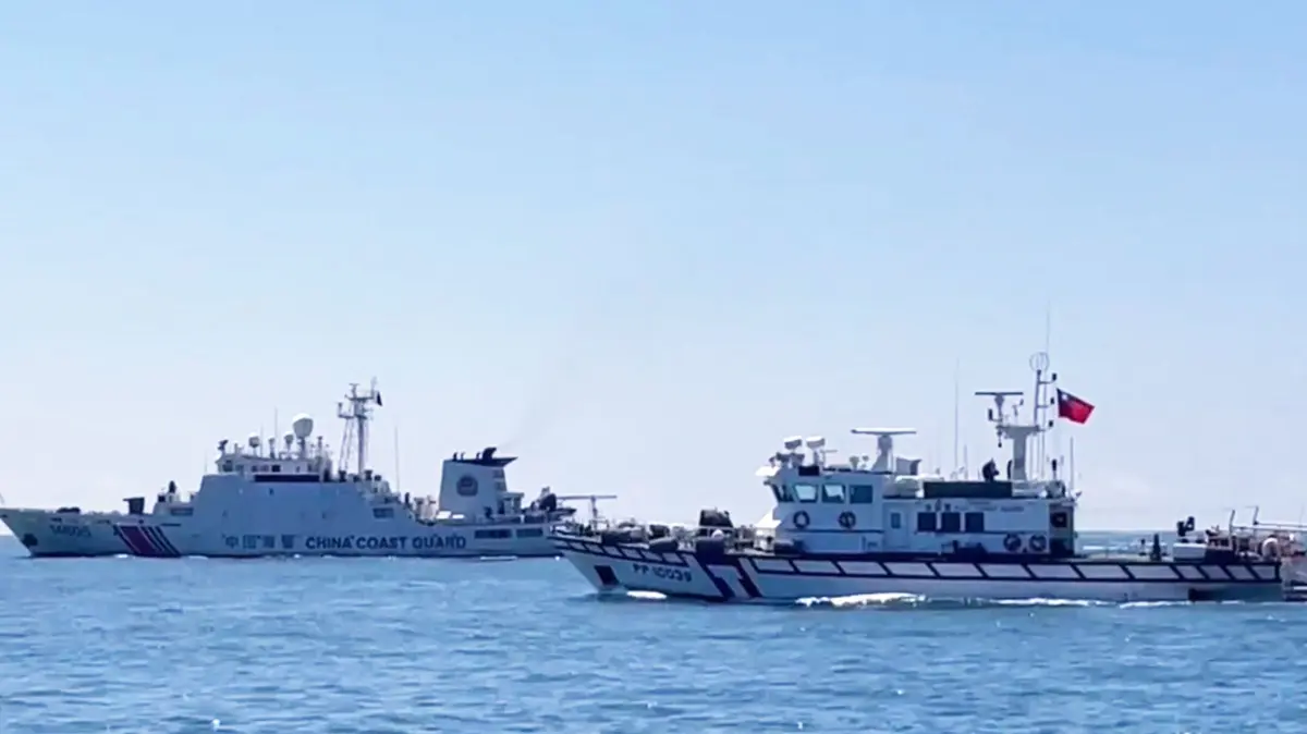 FILES-TAIWAN-CHINA-DEFENCE-MARITIME: (FILES) A handout photo from the Taiwan Coast Guard taken and released on July 8, 2026 shows a Taiwan Coast Guard patrol vessel (R) sailing near a China Coast Guard ship in waters south of Kinmen. China deployed a record number of coast guard, scientific research and other ships in Taiwan's waters in July 2026, the island's coast guard told AFP, as Beijing dials up pressure on Taipei. (Photo by Handout / TAIWAN COAST GUARD / AFP) / To go with Taiwan-China-defence, FOCUS by Allison Jackson, Joy Chiang and Peiju Teng
RESTRICTED TO EDITORIAL USE - MANDATORY CREDIT "AFP PHOTO / TAIWAN COAST GUARD" - NO MARKETING NO ADVERTISING CAMPAIGNS - DISTRIBUTED AS A SERVICE TO CLIENTS