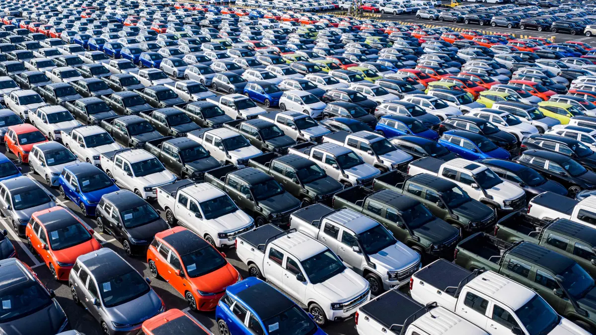 CHINA-ECONOMY-AUTO: BYD cars and pickup trucks are seen at Suzhou Port in China’s eastern Jiangsu province, before being loaded onto a ship for export to overseas markets, on September 7, 2026. (Photo by CN-STR / AFP) / China OUT