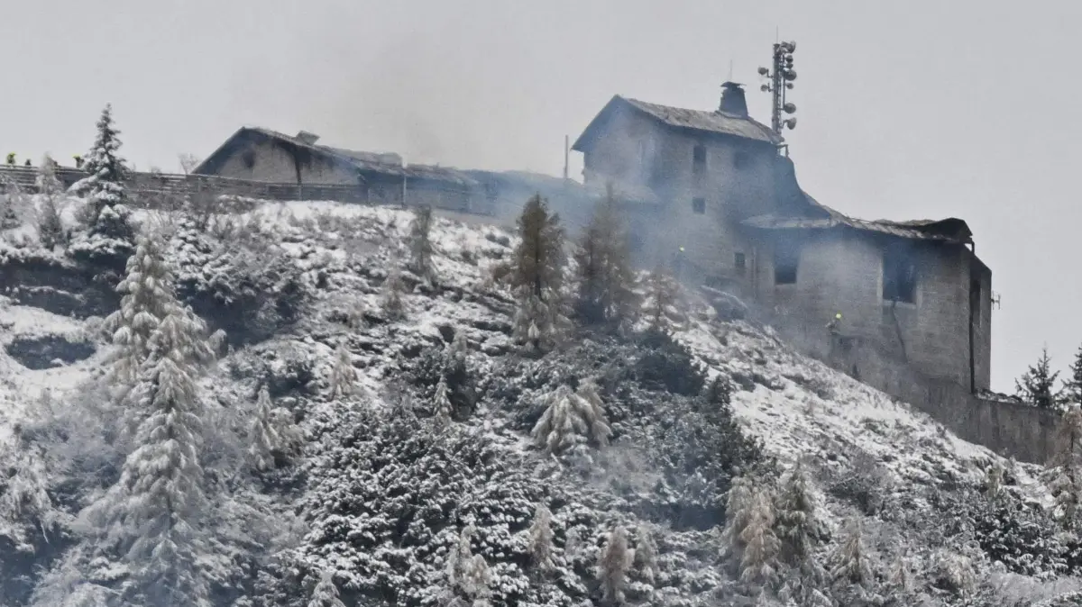 GERMANY-HISTORY-POLICE-FIRE-HITLER: The burnt mountain guesthouse Kehlsteinhaus, known as the Eagle's Nest, formerly Adolf Hitler's mountain retreat, on October 24, 2026, is pictured after a large fire had broken out at the site located at an altitude of 1,834 metres (6,000 feet) in the mountains over Berchtesgaden, in the southern German state of Bavaria. Emergency services arrived on site on late October 23, 2026 and found a large fire. German police said on October 24, 2026 they have detained a suspect following a fire at Adolf Hitler's mountain retreat, known as the Eagle's Nest. (Photo by KERSTIN JOENSSON / AFP)