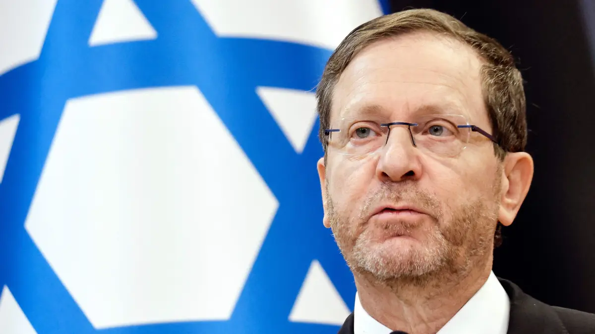 FILES-ISRAEL-VOTE: (FILES) Israel's President Isaac Herzog gives a press statement with Poland's president at the International Centre for Education about Auschwitz and the Holocaust in Oswiecim, Poland, on April 24, 2025. Israel's President Isaac Herzog is known for his unassuming and mild manner, but all eyes will soon be on him as he decides who to task with forming the next coalition government. The decision is a weighty one given that partial results show neither the camp of the Prime Minister Benjamin Netanyahu nor that of his rival Gadi Eisenkot securing a majority in parliament. (Photo by Wojtek RADWANSKI / AFP)