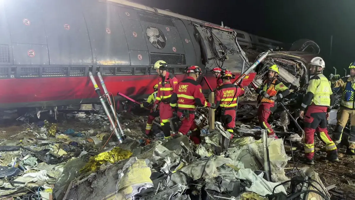 SPAIN-TRAIN-ACCIDENT-TRANSPORT: This still image from video released on October 29, 2026 shows members of Spain's Military Emergency Unit UME preparing to remove damaged carriages of a train crash between two high-speed units, a Renfe AVE train and an Iryo train which occured on October 28, 2026 around 150 km south of Madrid between Urda and Los Yebenes in the province of Toledo. A high-speed train collision south of Madrid killed 69 people and injured scores more, authorities said, in one of Europe's deadliest such disasters this century. The second such accident to strike Spain this year will raise fresh questions about the country's rail safety, with the transport minister speaking of an "error" and "inexplicable circumstances" that led to the crash. (Photo by Handout / UME / AFP) / RESTRICTED TO EDITORIAL USE - MANDATORY CREDIT "AFP PHOTO / SPAIN'S MILITARY EMERGENCY UNIT / HANDOUT / " - NO MARKETING NO ADVERTISING CAMPAIGNS - DISTRIBUTED AS A SERVICE TO CLIENTS